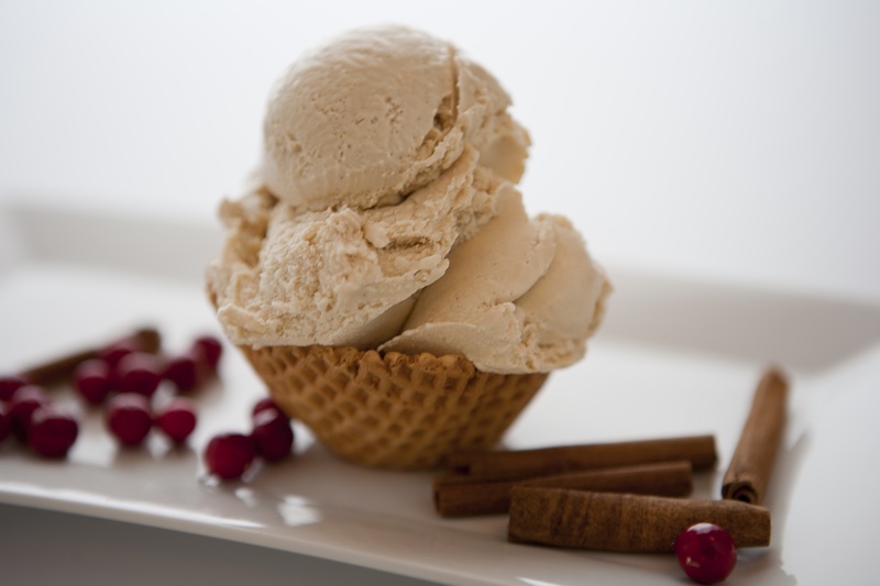 Guests choosing toppings at a custom ice cream catering station during a Schaumburg event, Guests enjoying catered ice cream dessert service at an Oak Brook event